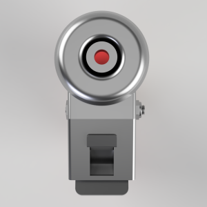 Front view of a silver mechanical device with a large circular front lens and red center atop a grey rectangular base.