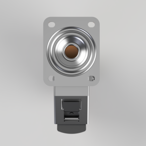 Close-up of a metallic push-button switch mounted on a square plate, with a circular, concentric bezel and a rectangular connector at the bottom.