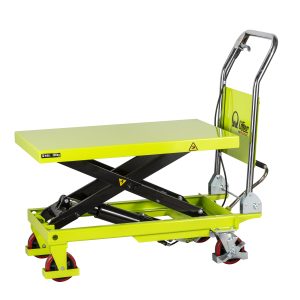 Yellow hydraulic scissor lift table on wheels with safety decals and metal frame.